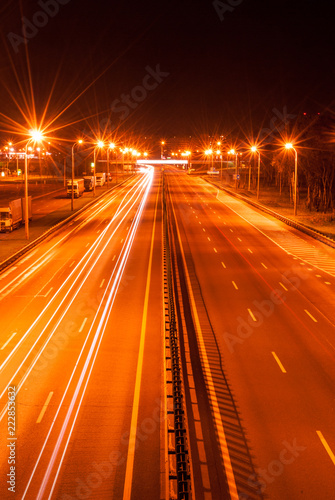 Highway, road at night, light trails on freeway