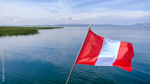 peruvian flag on the lake