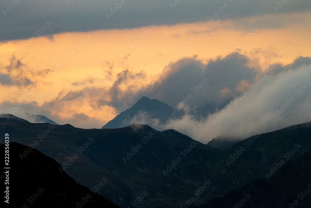 Cloud Formation Surrounds the Mountains at Sunset