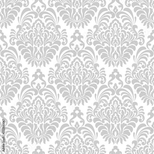 Vector damask seamless pattern background. Classical luxury old fashioned damask ornament, royal victorian seamless texture for wallpapers, textile, wrapping. Exquisite floral baroque template. © garrykillian