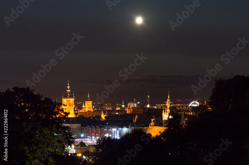 Urban landscape view with old town of Gdansk from Gradowa hill at night.