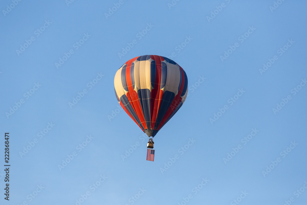 American flag flying on a hot air balloon American flag flying on a hot air balloon