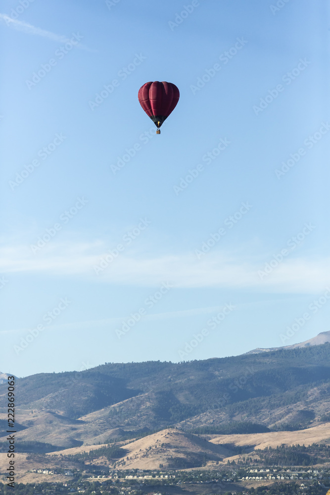 Hot air balloons flying in a beautiful blue clear sky