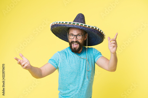 Happy mexican man smile in sombrero. Man smiling in mexican hat