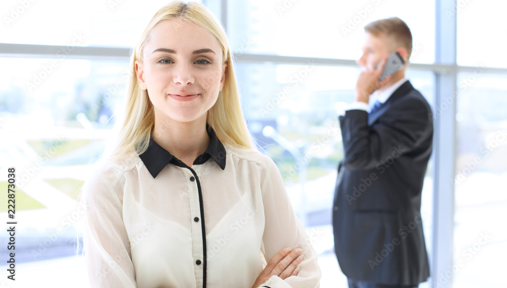Happy modern business woman or student girl in office hall Happy modern business woman or student girl in office hall