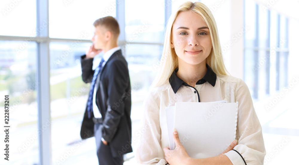 Happy modern business woman or student girl in office hall Happy modern business woman or student girl in office hall