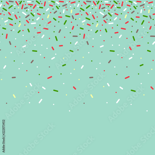 Seamless pattern with colorful sprinkles.