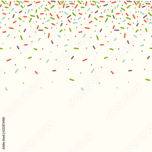 Seamless pattern with colorful sprinkles.
