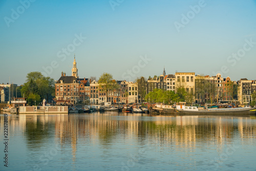 Morning view of the historical Montelbaanstoren Tower and cityscape