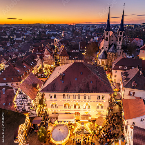 Panoramic view of the german city of Bad Wimpfen with traditional christmas market and the city church during the blue hour. HDR taken from the blue tower (Blauer Turm).