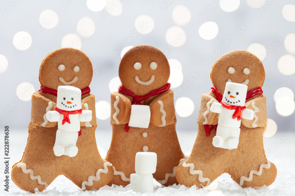 Funny Gingerbread cookie men with cute marshmallow snowman Funny Gingerbread cookie men with cute marshmallow snowman