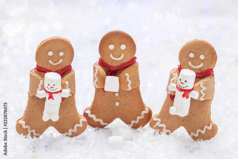 Funny Gingerbread cookie men with cute marshmallow snowman Funny Gingerbread cookie men with cute marshmallow snowman