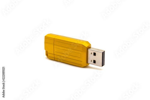 Yellow USB flash drive on white isolated background