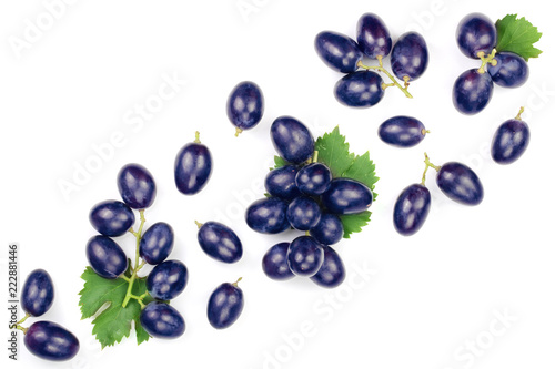blue grapes isolated on the white background with copy space for your text. Top view. Flat lay pattern