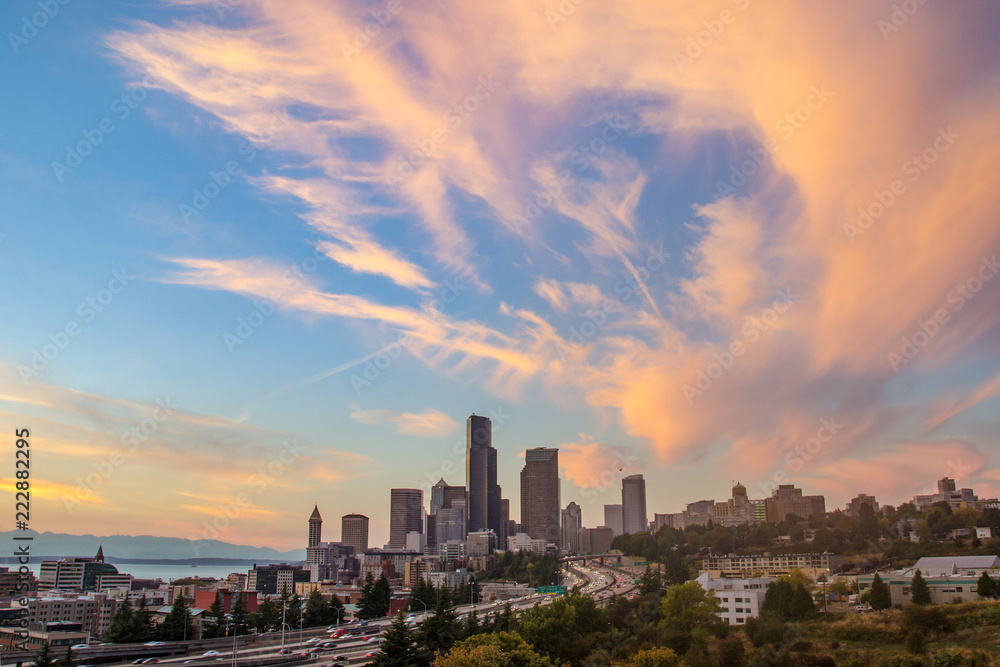A view of the highway and the Seattle city skyline at Sunset
