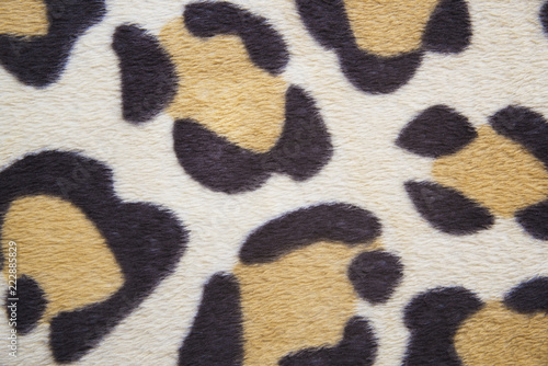 leopard patterned fabric close up background wallpaper