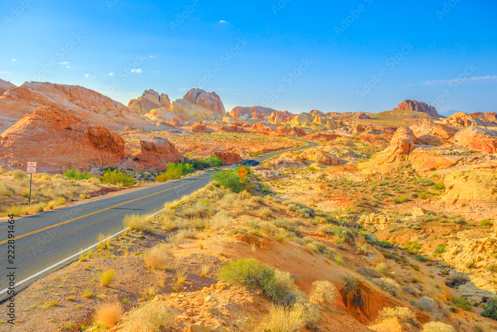 The scenic drive White Domes Road crosses Valley of Fire State Park to become the colorful Rainbow Vista Road. Valley of Fire is located in Mojave Desert, 58 miles of Las Vegas, Nevada, Unites States.