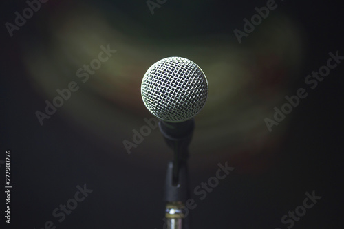 Analog microphone on stand.