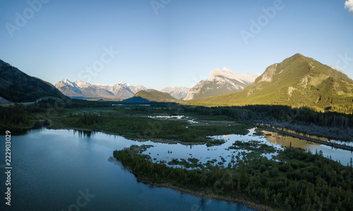 Aerial panoramic view of Vermilion Lakes during a vibrant summer sunset. Taken in Banff  Alberta  Canada.