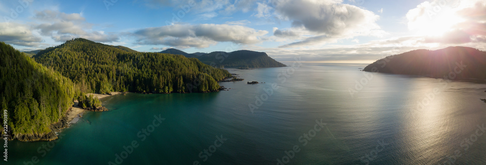 Striking aerial panoramic view of the Pacific Ocean Coast during a vibrant summer sunset. Taken in San Josef Bay, Cape Scott, Northern Vancouver Island, BC, Canada.