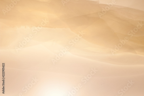 Abstract bright colorful fabric background in the form of a wave