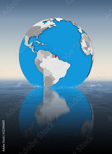 French Guiana on globe in water
