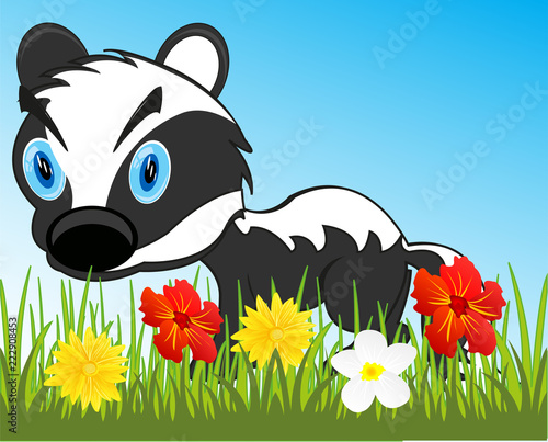 Wildlife badger on year glade with flower