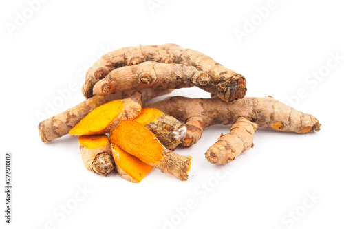 Fresh turmeric on white background. Herbal photo