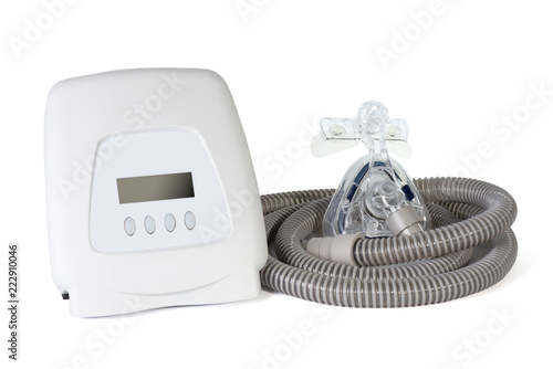 Cpap  components..A continuous positive airway pressure with premium quality of mask and hose used for obstructive sleep apnea patient ,isolated on white background .