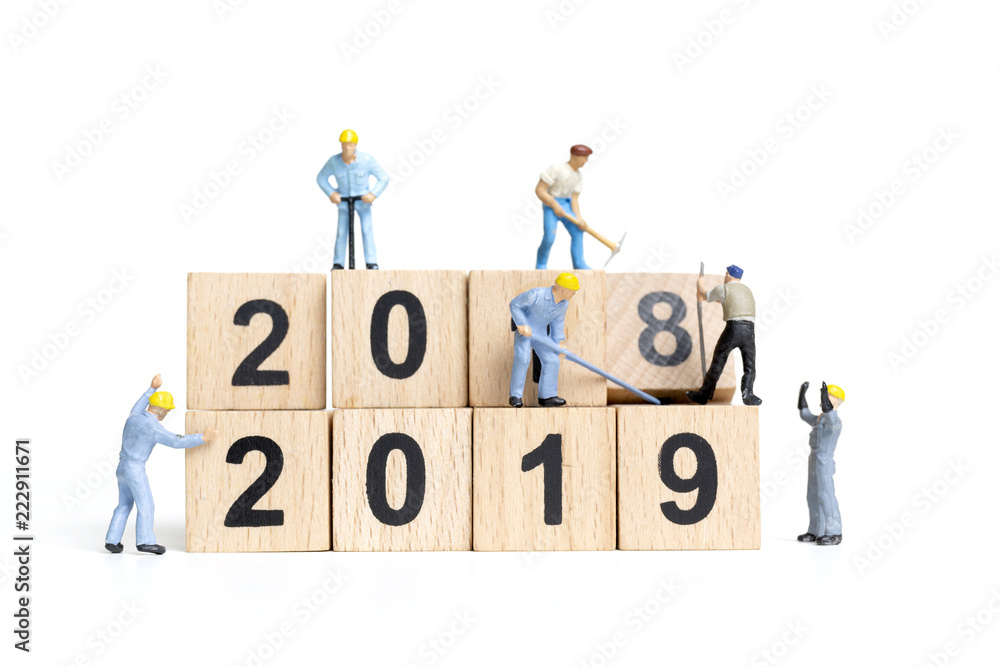 Miniature worker team building number 2019 on white background , Happy new year 2019 concept Miniature worker team building number 2019 on white background , Happy new year 2019 concept