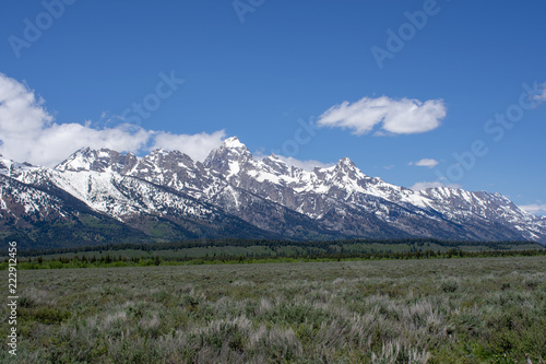 tetons and clouds
