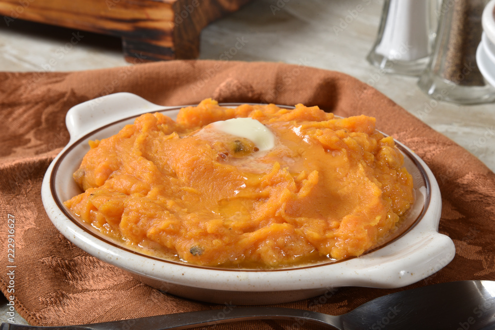 Butter melting on mashed sweet potatoes Butter melting on mashed sweet potatoes