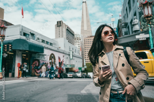 Photography woman looking confident and using smart phone