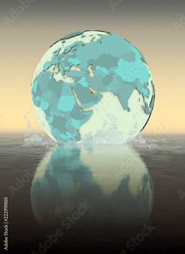 Fototapeta Naklejka Na Ścianę i Meble -  Qatar on globe splashing in water