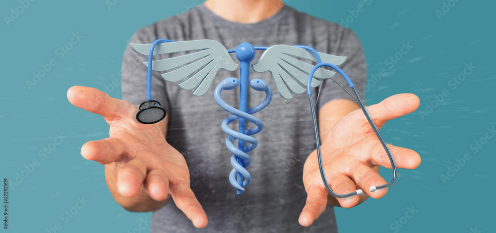 Fototapeta premium Businessman holding a 3d redering medical cadaceus and stethoscope
