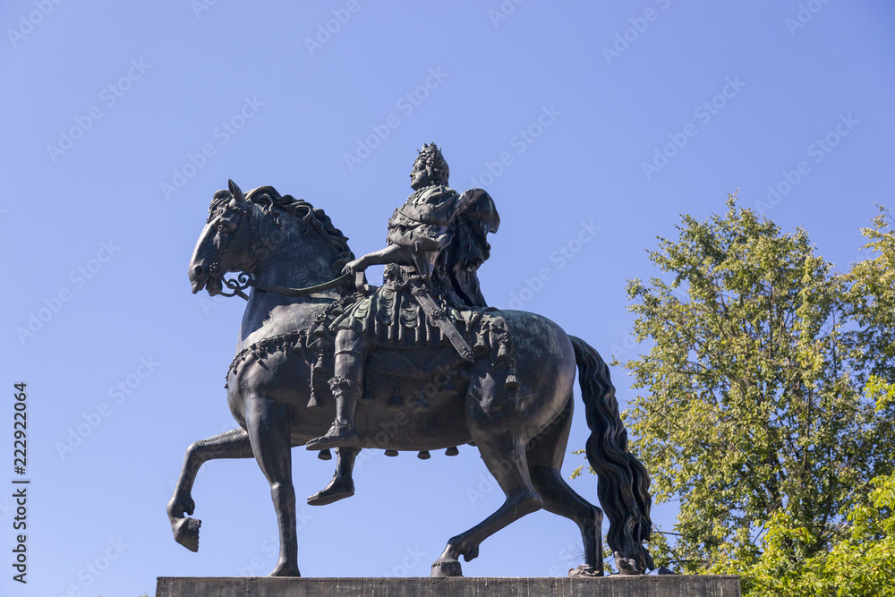 St. Petersburg, Russia - August 08, 2018: Bronze equestrian monument of Peter the Great in front of St. Michael's Castle in St. Petersburg.