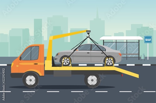 Road assistance. Car evacuator drive on the road. 