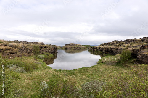 View of Lake Myvatn with various volcanic rock formations in Iceland