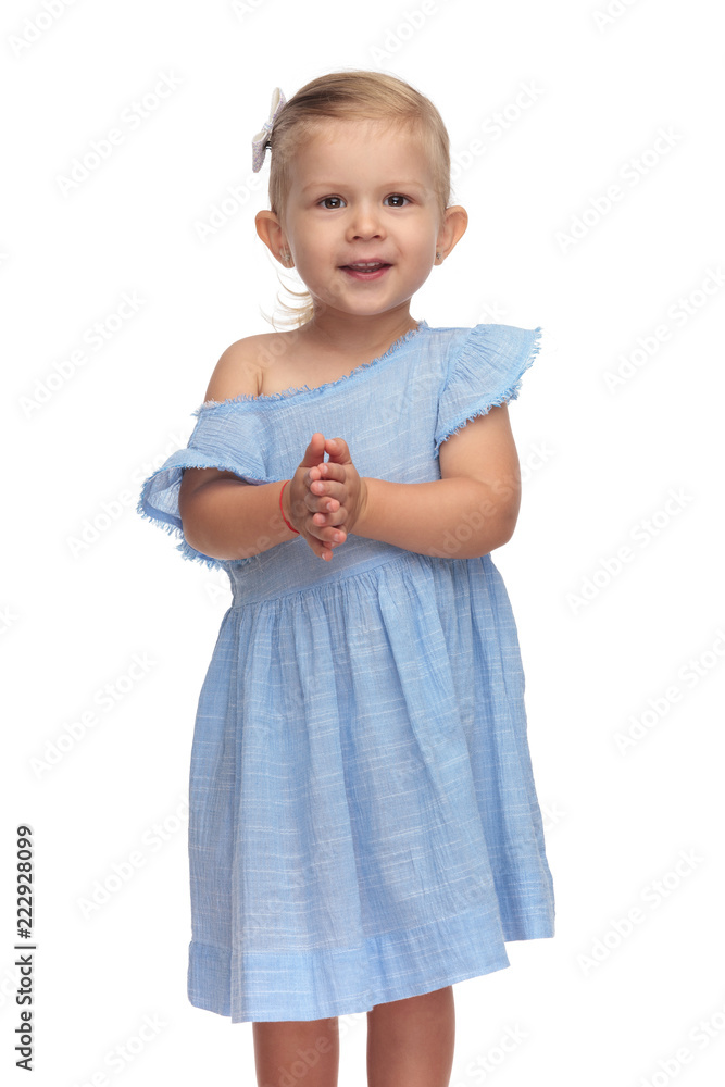 smiling little girl is applausing smiling little girl is applausing