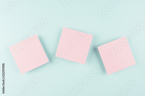 Halloween advertising mock up - three pink blank sale card soar on candy pastel mint blue background.
