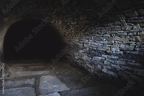 Scary underground, old castle cellar	