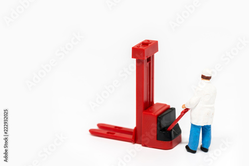 Miniature people delivery worker on white background with a space for text