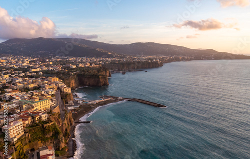 Sorrento city and coast with golden sunset © Jose