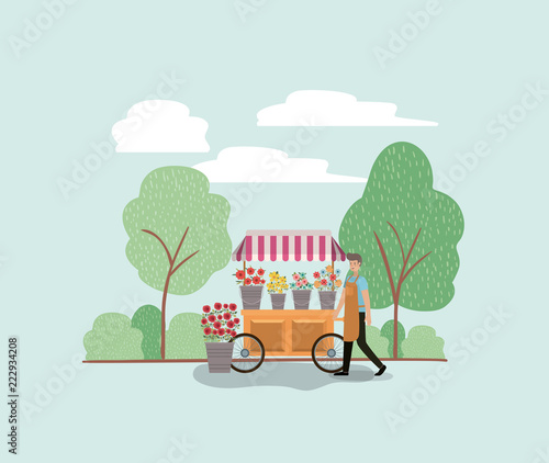 man with plants vivarium in cart