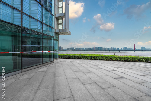 Panoramic skyline and buildings with empty square floor