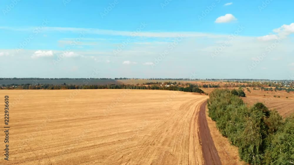 Take-off above agricultural farm fields or meadows in countryside or farmland, shot from drone, aerial panoramic view Take-off above agricultural farm fields or meadows in countryside or farmland, shot from drone, aerial panoramic view
