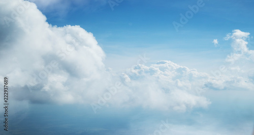 Fototapeta Naklejka Na Ścianę i Meble -  Blue sky and clouds background with lots of copy space.