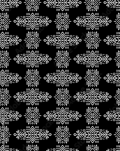 Vector Seamless Pattern in Ethnic Style. Creative tribal endless ornament, perfect for textile design, wrapping paper, wallpaper or site background. Trendy hand drawn boho tile. photo