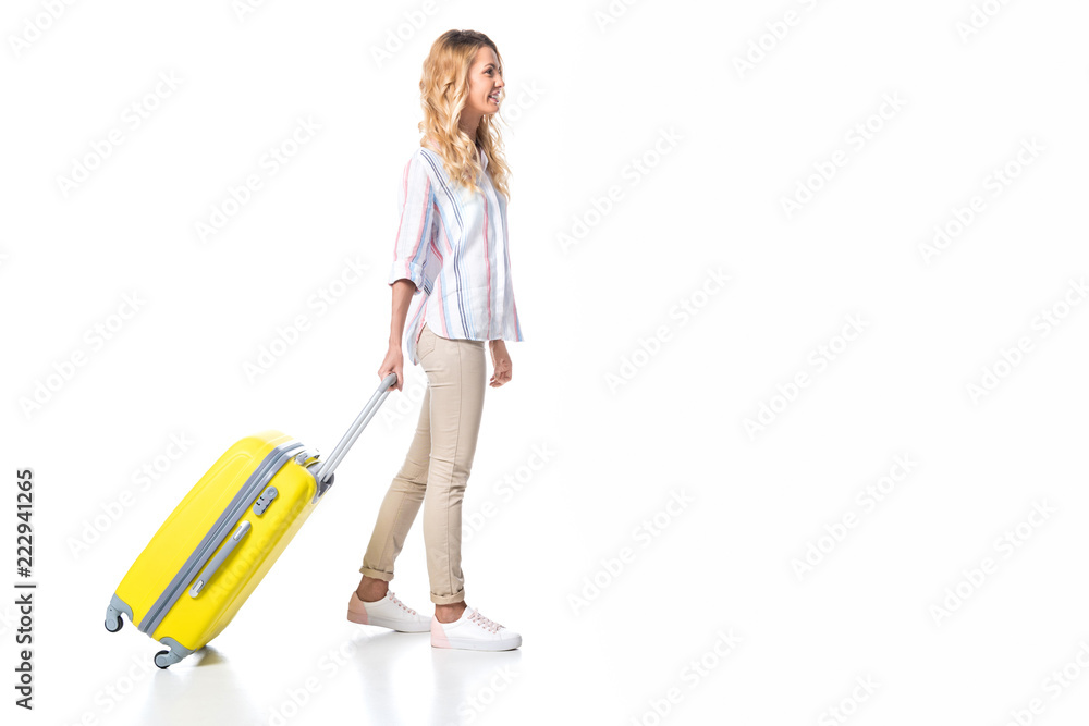 woman with yellow travel bag isolated on white woman with yellow travel bag isolated on white