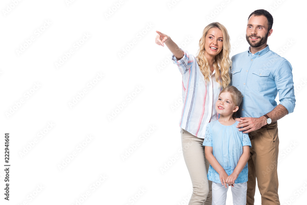 smiling family with woman showing on something isolated on white smiling family with woman showing on something isolated on white